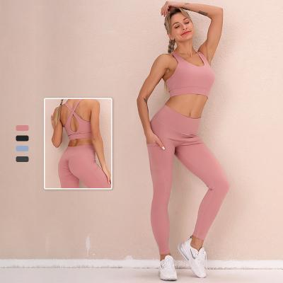 China Breathable Pink Hollow Custom Women Gym Yoga Sets Gym Workout Workout Fitness Wear Sports Wear Sports Bra Panty Set for sale