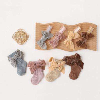 China QUICK DRY Spanish Soft Cotton Knitted Baby Socks Toddler Girls Baby Girls Velvet Bow Socks Big High for sale