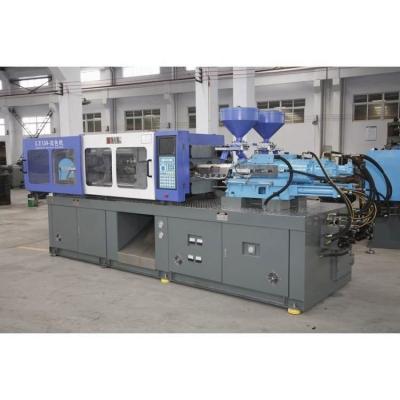 China Horizontal Servo Motor 140T Energy Saving Plastic Injection Molding Machine for sale