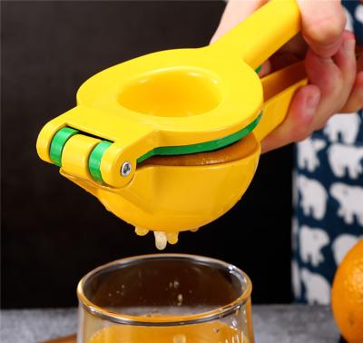 China Sustainable Amazon Top portable lemon lime squeezer mini manual metal fruit citrus juicer hand press manual lemon squeezer for sale