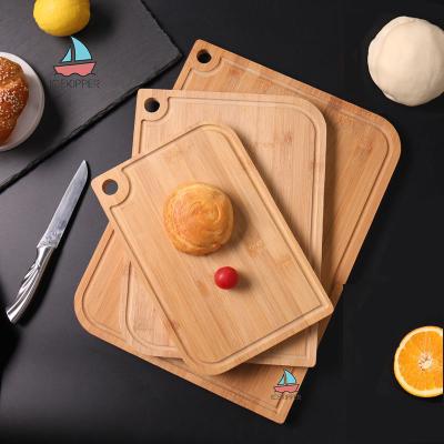 China Sustainable Custom Kitchen Reversible Butcher Block Organic Bamboo Cutting Board 3 in 1 Chopping Board Set with Juice Groove for Meat Cheese for sale