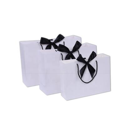 China Printing Logo Recyclable Customized Portable Paper Tote Bags With Butterfly Gift Bag for sale