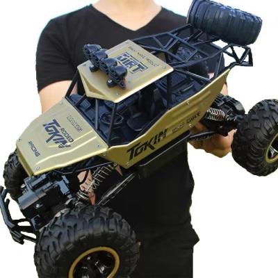 China Rapazes 1 18 Carro RC de plástico de alta velocidade Off-road Veículo de controle remoto Carro de corrida 4WD liga à venda