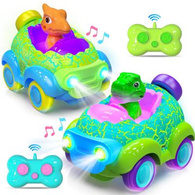 Cina Auto a controllo remoto elettriche 2.4G Cartoon Dinosauro Radio Toys per ragazzi Ragazze in vendita