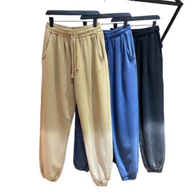 China Anti-wrinkle gym runner spray painted white mens pants wash pants for sale