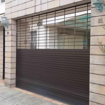 China Transparent Punched Steel Roller Shutter Door Electric Roller Shutter Garage Doors for sale