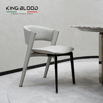 China Elegant High End Nordic Foshan Cowhide Stainless Steel Genuine Leather Luxury Dining Chairs for sale