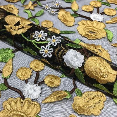 China Viable Elaborate Elegant Yellow Flat Nylon Net Fabric Of Flower Pattern Embroidery For Woman Kid Dress for sale