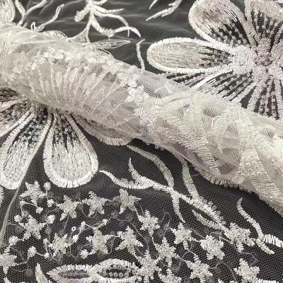 China Viable White Tulle Mesh Sequin Lace Fabric Wedding Bridal Beaded Sequin Embroidery Lace Fabric for sale