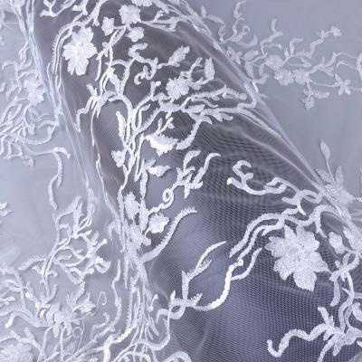 China Sustainable Lace Fabric For Wedding Beaded Bridal Lace Fabric For Clothing for sale