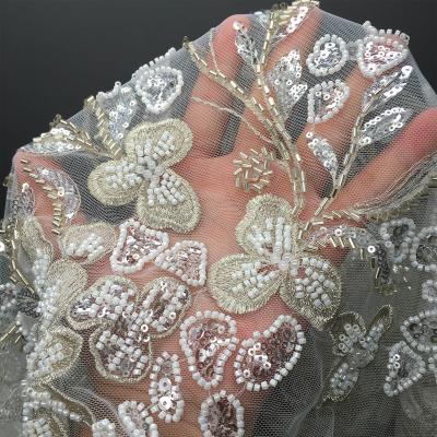 China Sustainable Lace Fabric With Metallic Beading Embroidery Thread Bead Beaded Bridal Lace Fabric for sale