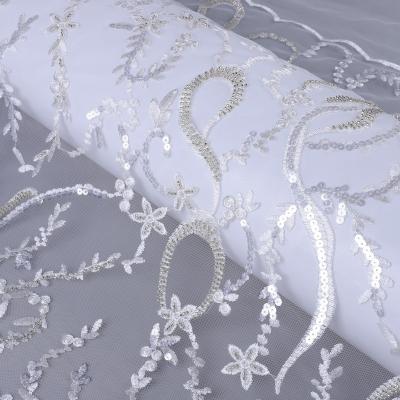 China Viable Gorgeous Transparent Crystle Sequin Lace Fabric Bridal Dress Lace Beads Lace Fabric for sale