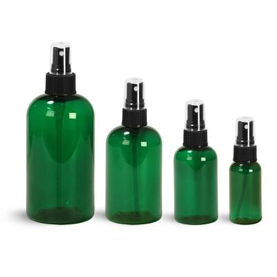 China BEAUTY PACKAGING PET Boston Green Round Bottles With Black Ribbed Fine Mist Sprayers for sale