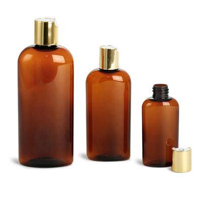 China Household Products Plastic Bottles , PET Cosmo Amber Oval With Black Disc Top Caps for sale