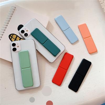 China Wholesale New Style Adjustable Phone Holder For Small Portable Folding Absorption Mobile Phone Stick Back Bracket for sale