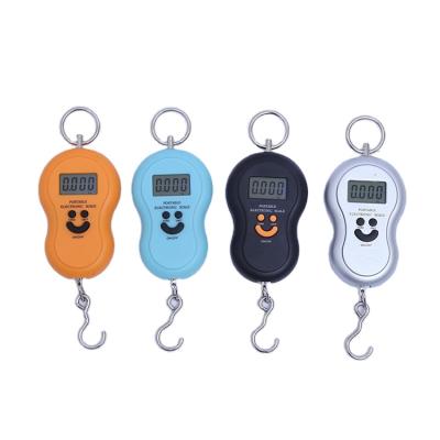 China 2021 New Design Scale Portable Multicolor Electronic Portable Travel Luggage Scale With Smile Face for sale