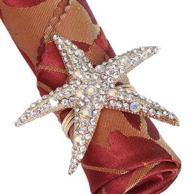 China Stocked Latest Starfish Napkin Ring Napkin Buckle Wedding Hotel Table Set Rhinestone Ornaments Napkin Ring for sale