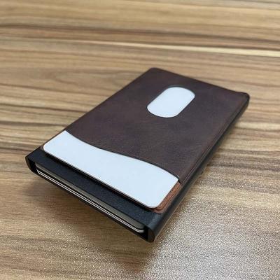 China Fashion High Capacity For Gifts Slim Aluminum Rfid Card Quick Release Button Wallet for sale