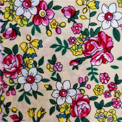 China Shrink-resistant cotton jacquard flowers printed fabric for children girls dress skirt printing for sale