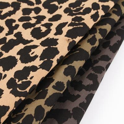 China Anti-Static Chinese Textiles Animal Design Leopard Color Custom Printed Denim Fabric for sale