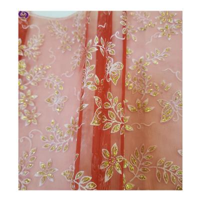 China Tear-resistant Christmas hot sale and style printed with bronzing100%poly organza fabric (foil, gold) for sale