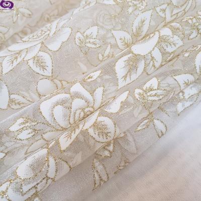 China Tear-resistant Christmas hot sale and style printed with bronzing100%poly organza fabric for sale