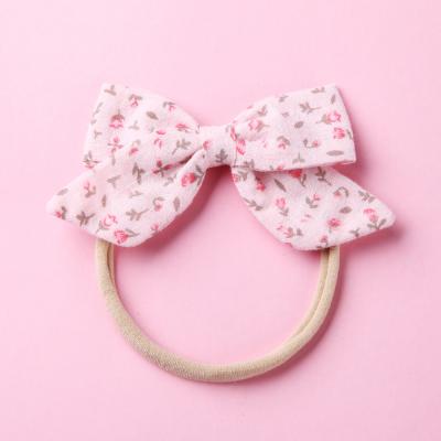 China Hair accessories baby headband best-selling printed cotton and bow canvas headband with soft children's hair ornaments girl's headband for sale