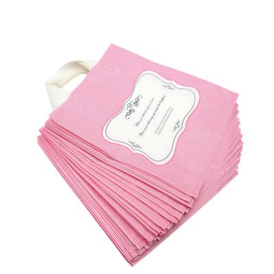 China Moisture Proof Self Adhesive Plastic Sealing And Seal Handle Mailing Bag for sale