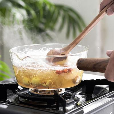 China Sustainable Wholesale Clear High Borosilicate Heat Resistant Pyrex Glass Cooking Pot With Wooden Handle for sale