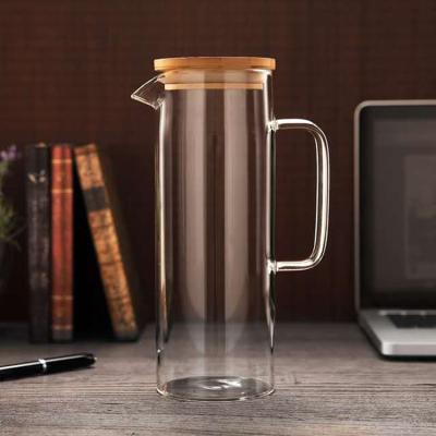 China Large Capacity 1500ml Viable Clear Borosilicate Heat Resistant Glass Teapot Juice With Bamboo Lid for sale