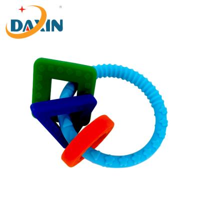 China Baby Teether Wristband Food Grade Silicone Waterproof Teether Ring Nursing Safe Organic Easy Plug Teether Keys for sale