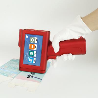 China Factory Red Denim M10 Smart Handheld Inkjet Printer Date Production Barcode Printer Food Bag Two-Dimensional Inkjet Printer à venda