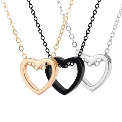 China New Durable Hollow Heart Shape Necklace Valentine's Day Jewelry Love Heart Lovers Necklace for sale