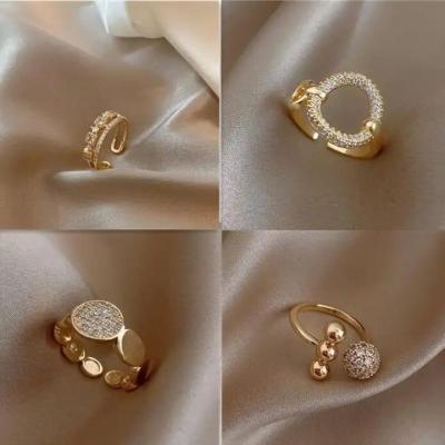 China Latest Simple Design Designer TRENDY Zircon Stone Finger Rings For Ladies Beautiful 18k Gold Crystal Ball Ring for sale