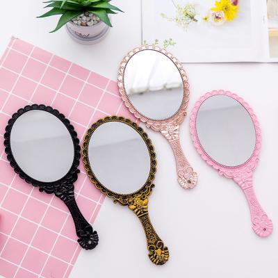 China Creative Retro Lighted Pattern Makeup Mirror Easy To Carry Makeup Handheld Mirror for sale