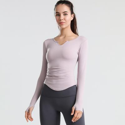 China Breathable sports long sleeved women's fitness tops autumn and winter style self-cultivation yoga clothes quick drying stocking ts for sale