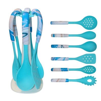 China Sustainable Non Stick Silicone Kitchen Utensil With Colorful Stylish Plastic Handle Coating for sale