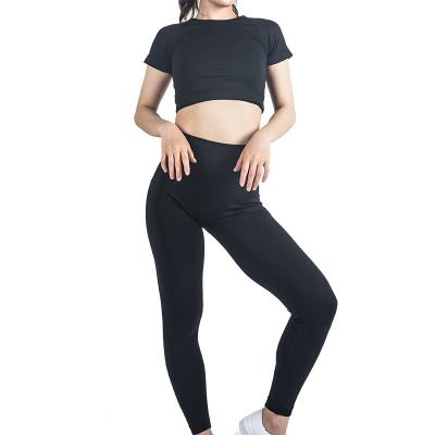 China New breathable European and American style sportswear women's fitness little buttocks seamless tight pants fitness short sleeve yoga suit set for sale