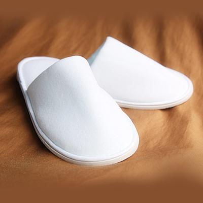 China Hotel completely wrapped velvet slippers winter indoor slipper for sale