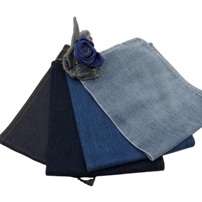 China Roll Proof 9.7oz Cotton Indigo Denim Fabric 100% Blue Cotton For Jeans Shirt Bags for sale