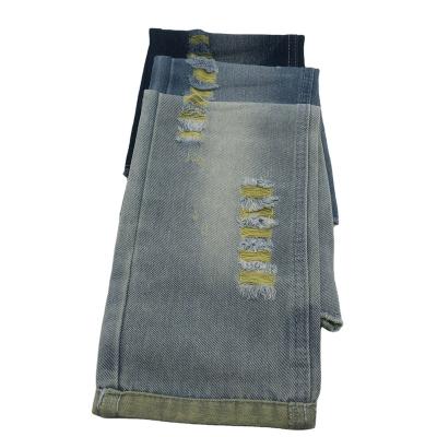 China Windproof deep blue exterior 9.5oz denim with yellow earth for sale