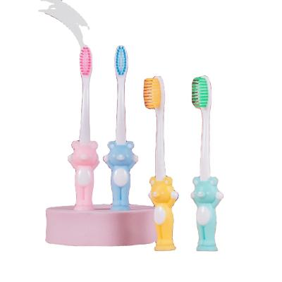 China Reusable Good Quality Macaron Silicone Bear Cartoon Teeth Cleaner Protect Teeth Kids Toothbrush for sale