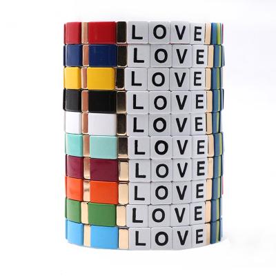 China BOHEMIA 2021 Different Design Color Mix Alphabet Rainbow Painted Enamel Stretch Tile Bead Bracelet New for sale