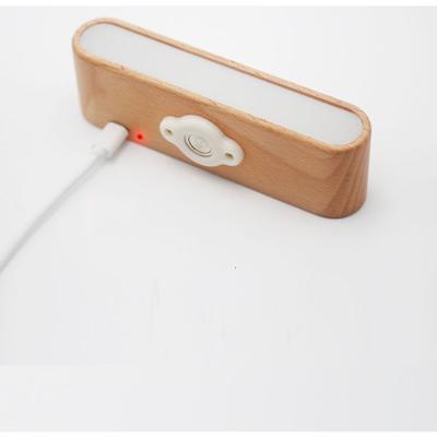 China Modern Wiring and Magnetic Solid Wood Wall Lamp Without Punched Bedside Lamp for sale