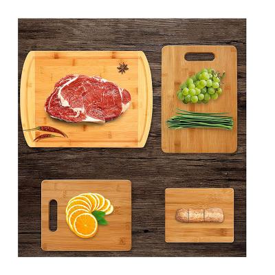 China Best Sustainable Selling Money Bamboo Four-piece Carving Board Set Cutting Board for sale