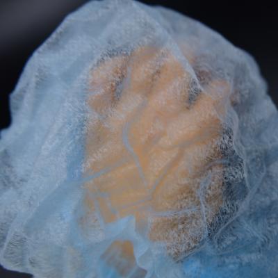 China Sustainable Lightweight Nonwoven Fabric Customized Plastic Shower Cap for sale