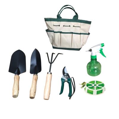 China GARDEN TOOL KIT adult garden tool bag set with hand trowel, shovel, rake, pruner, sprayer for sale