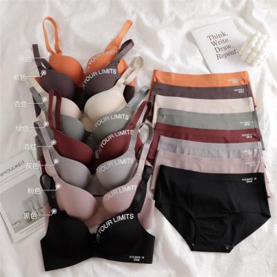 China QUICK DRY Custom Logo Letter Small Cup Women's Seamless Lift Up Panties Bra Set Sexy Panties And Bra Sets for sale