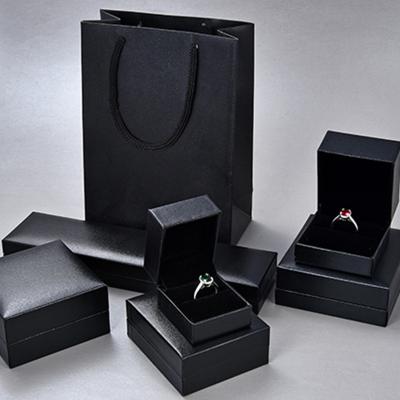 China PU Leather Logo Black Jewelry Box Custom Made Leather Ring Necklace Bracelet Box Luxury Wholesale for sale