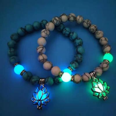 China Jane Eyre Wholesale New Fashion Daily 8mm Turquoise Beaded Yoga Lotus Cage Charm Luminous Bracelets for sale